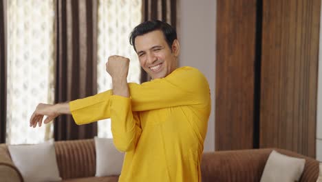 Indian-man-doing-arm-and-hand-stretch-exercise