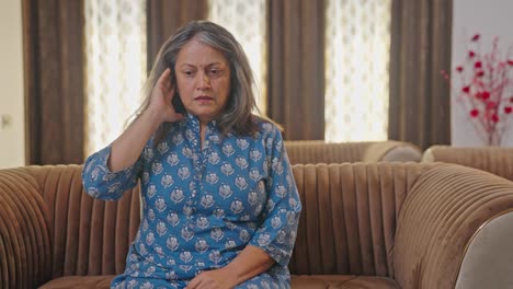 Aged-Indian-woman-suffering-from-hair-loss-disease