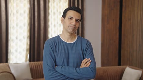 Indian-father-standing-crossed-hands-and-thinking
