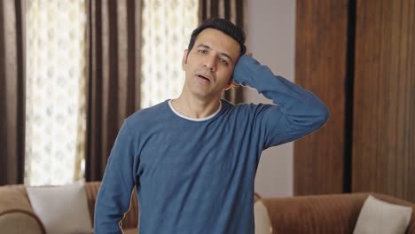 Indian-man-doing-neck-stretch-exercise