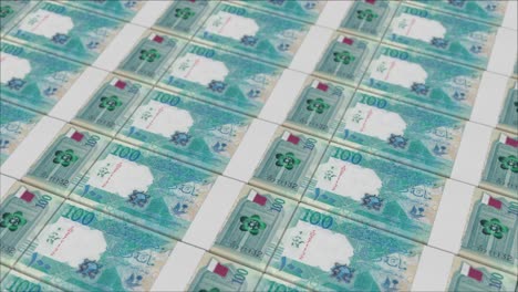 Billetes-De-100-Riales-Qataríes-Impresos-Por-Una-Prensa-Monetaria