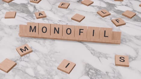 Monofil-Wort-Auf-Scrabble