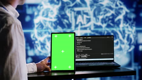 AI-script-coding-on-green-screen-tablet