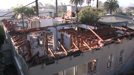 Time-lapse-of-crews-demolishing-a-house