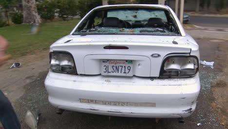 A-man-destroys-his-car-with-a-sledgehammer-5