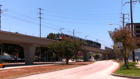 Rapid-transit-train-on-elevated-railway-moves-through-Los-Angeles