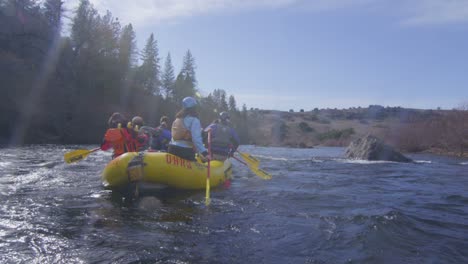 Rafters-paddle-down-a-fast-flowing-river