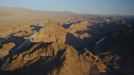 Aerial-view-of-mountains-and-the-highway-leading-to-the-Hoover-Dam
