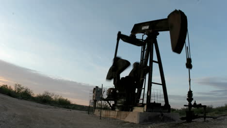 Time-lapse-shot-of-an-oilrig's-movement-throughout-the-day-and-into-the-night-1