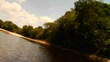 POV-shot-going-down-the-Amazon-River-in-Brazil