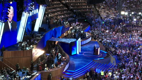 Former-President-Bill-Clinton-Is-Mirrored-On-The-Big-Screens-Behind-Him-As-He-Delivers-A-Pro-Barack-Obama-Speech