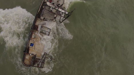 Aerial-Shot-Over-A-Shipwrecked-Fishing-Boat-Near-Ventura-California