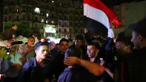 Protestors-chant-at-a-nighttime-rally-in-Cairo-Egypt