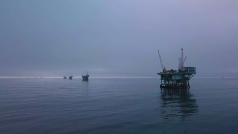 Moody-And-Mystical-Vista-Aérea-Shot-Of-Oil-Derricks-And-Platforms-Off-The-Coast-Of-Santa-Barbara-In-The-Channel-Islands
