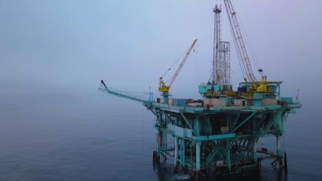 Moody-And-Mystical-Aerial-Shot-Of-Oil-Derricks-And-Platforms-Off-The-Coast-Of-Santa-Barbara-In-The-Channel-Islands-1