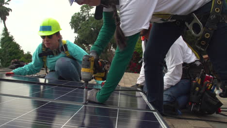 Workers-Install-Solar-Panels-On-The-Roof-Of-A-Middle-Class-House-3