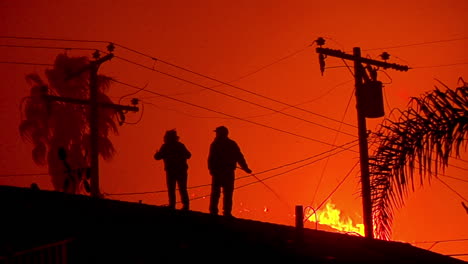Residents-Water-Down-Their-Homes-Roofs-And-Yards-As-The-Thomas-Fire-Approaches-In-The-Hills-Of-Ventura-And-Santa-Barbara