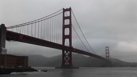 View-Of-The-Golden-Gate-Bridge'S-Incredible-Span-Across-San-Francisco-Bay-On-A-Foggy-Day