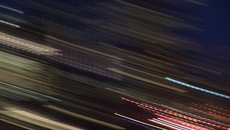 A-Handheld-Camera-Zooms-In-And-Out-Creating-Abstract-Often-Explosive-Images-Of-Seattle-At-Night