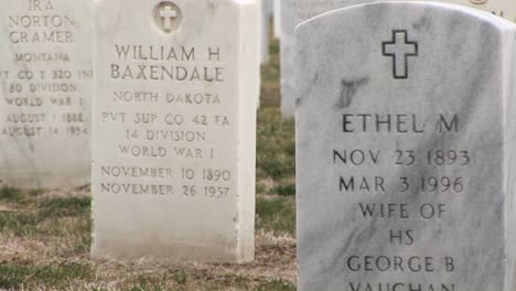 A-Closeup-Look-At-The-Inscriptions-On-The-Marble-Headstones-In-Arlington-National-Cemetery