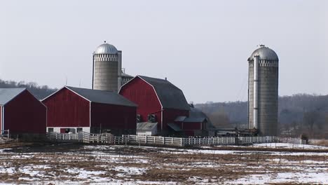 Long-Shot-Of-Wellkept-Classic-American-Farm-Buildings-In-Early-Winter