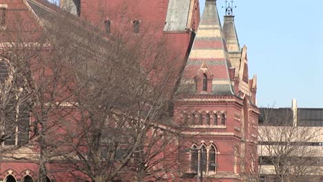 Students-Walk-Across-Campus-As-The-Camera-Pans-Up-One-Of-Harvard'S-Churches