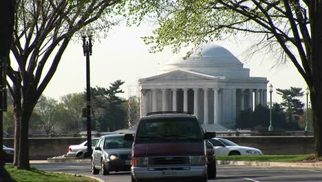 Traffic-Passes-In-Front-Of-The-Jefferson-Memorial-Building