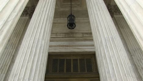 View-Of-Columns-A-Hanging-Lamp-And-Bronze-Doors-At-The-West-Entrance-Of-The-Supreme-Court