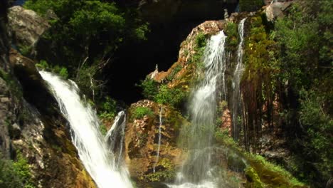 Mediumshot-Of-Waterfalls-Flowing-Into-A-Pool-In-Big-Sur-California