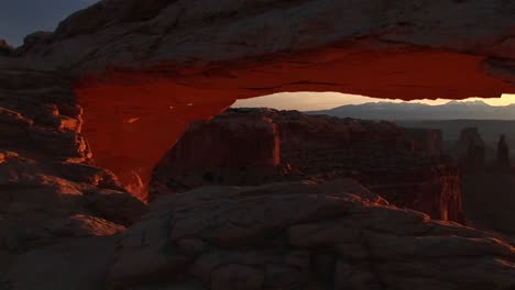 Pandown-Of-Mesa-Arch-To-Reveal-And-Frame-Distant-Mountains-Inside-Canyonlands-National-Park