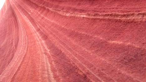 Nahaufnahme-Des-Wirbelnden-Musters-In-Einer-Felsformation-Aus-Orangefarbenem-Sandstein
