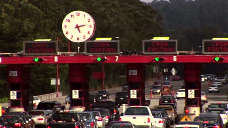 Timelapse-of-traffic-moving-through-a-tollbooth