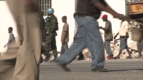 Long-lines-of-refugees-wait-on-the-streets-of-Haiti-following-their-devastating-earthquake-5