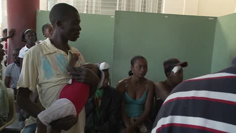 Haitians-wait-in-a-refugee-center-for-news-of-victims-of-the-Haiti-earthquake