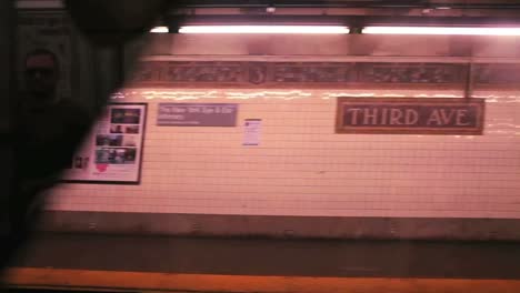 View-from-a-subway-car-as-it-passes-through-a-station-in-New-York-City