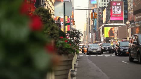 Pan-right-to-a-view-of-traffic-passing-on-a-busy-street-in-New-York-City