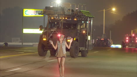 Large-military-style-vehicles-roll-through-Ferguson-Missouri-during-rioting-there