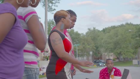 Mourners-gather-at-a-makeshift-memorial-for-Michael-Brown-in-Ferguson-Missouri-with-intersection-sign