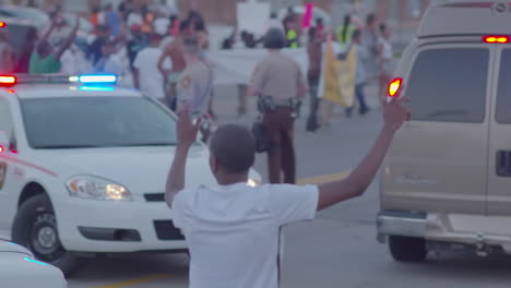 Protesters-march-and-chant-in-the-streets-of-Ferguson-Missouri
