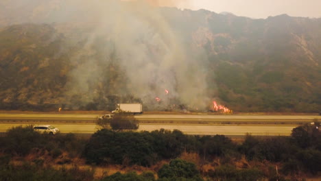 Aerial-of-firefighters-battling-the-huge-Thomas-fire-in-Ventura-County-along-the-101-freeway-1