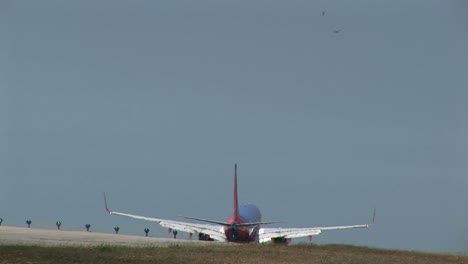 A-Southwest-jet-airplane-lands-on-an-airport-runway-1