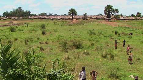 Panshot-of-open-fields-and-a-refugee-camp-in-Northern-Uganda-Africa
