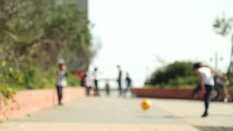 Kids-Playing-Football-Blurred