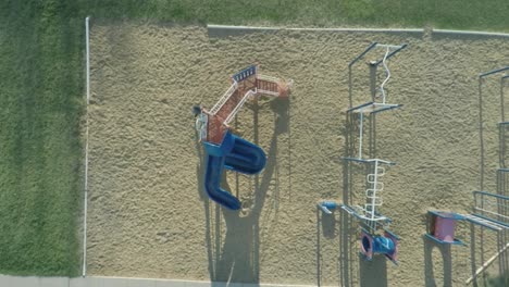 Aerial-Child-Going-Down-Slide