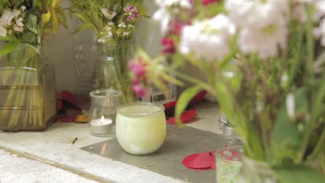 Memorial-with-Candles-and-Flowers