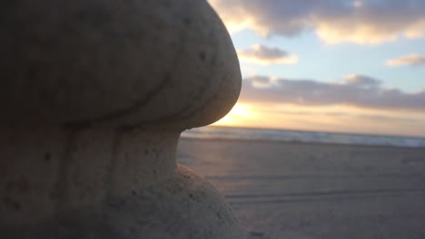 Stone-Planter-on-Beach-Close-Up-HD-Stock-Footage