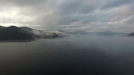 Flying-Over-Misty-Coastline