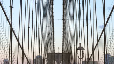 Panning-Down-to-show-Poeple-Walking-Over-Brooklyn-Bridge