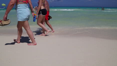 Tourists-Walking-along-Mexican-Beach