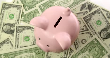 Piggy-Bank-on-Dollar-Bills-Top-View